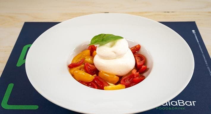 Burratina del Vesuvio with heirloom tomatoes and basil