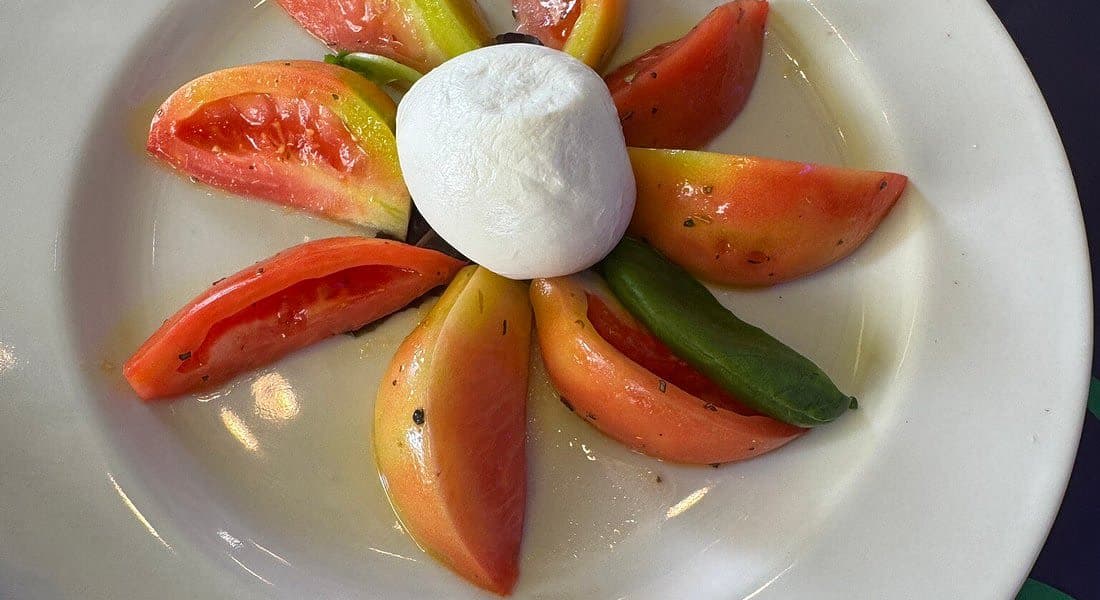 Caprese colonne with buffalo mozzarella DOP and heirloom tomatoes