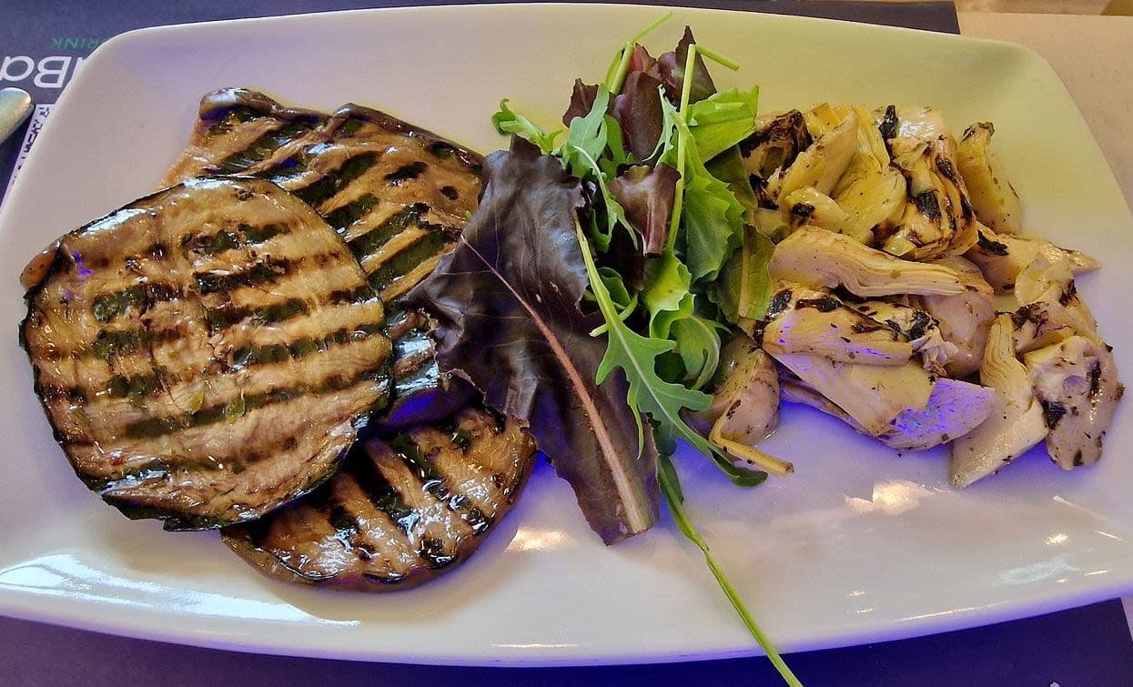 Grilled eggplant and artichoke with arugula